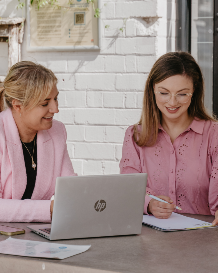 two women family lawyers discussing cases
