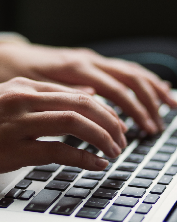typing on laptop